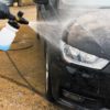 Hydro Blast car cleaning product being applied to black Audi